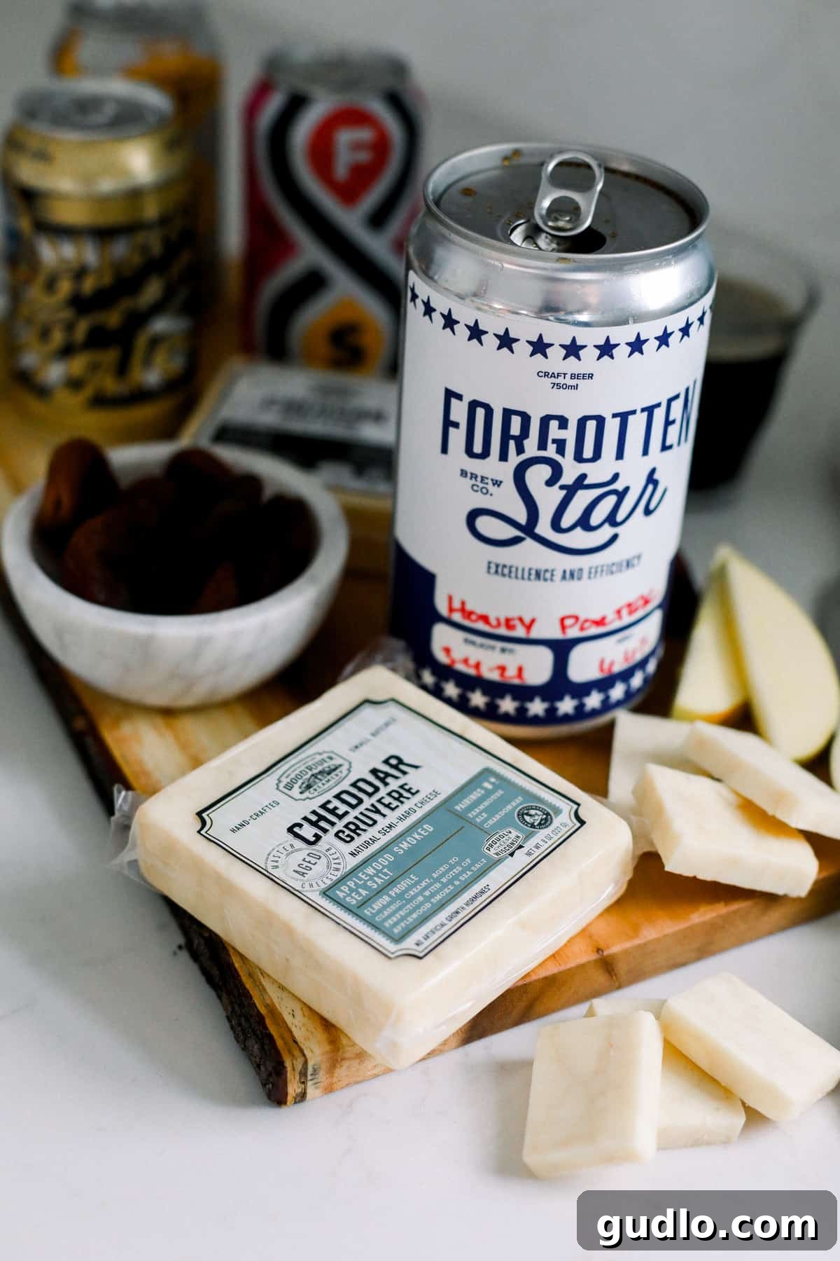 Smoky Cheese & Sweet Porter: A Perfect Autumn Pairing Wood River Creamery Applewood Smoked Sea Salt cheese with sliced apples and dried apricots, paired with Forgotten Star Brewing Boiler Room Honey Porter.