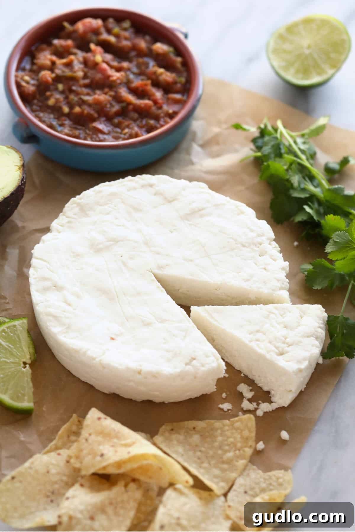 The Art of Making Queso Fresco at Home 2 Freshly made queso fresco on parchment paper, ready to be served.