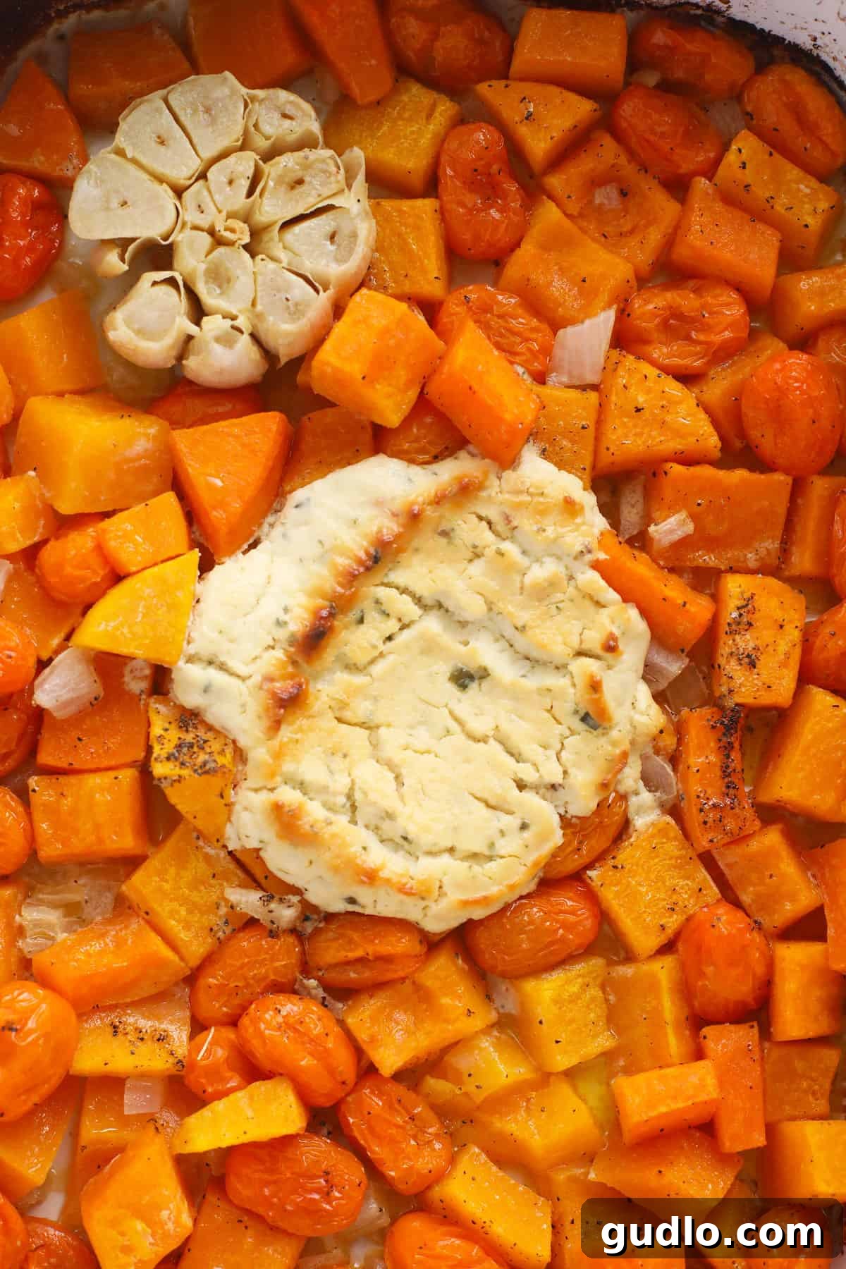Perfectly Roasted Veggies and Melted Boursin Roasted vegetables and softened Boursin cheese in a casserole dish after baking