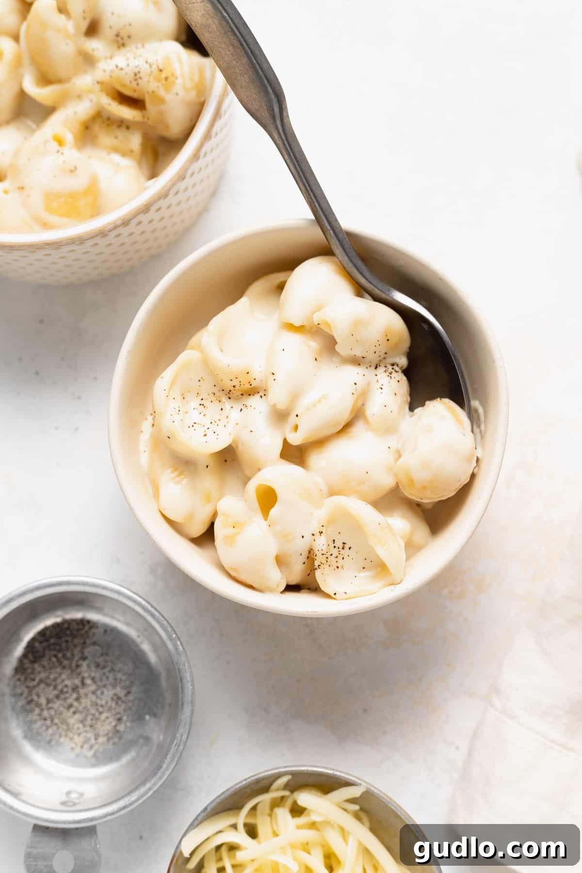 A bowl of creamy, delicious white cheddar mac and cheese ready to be enjoyed.