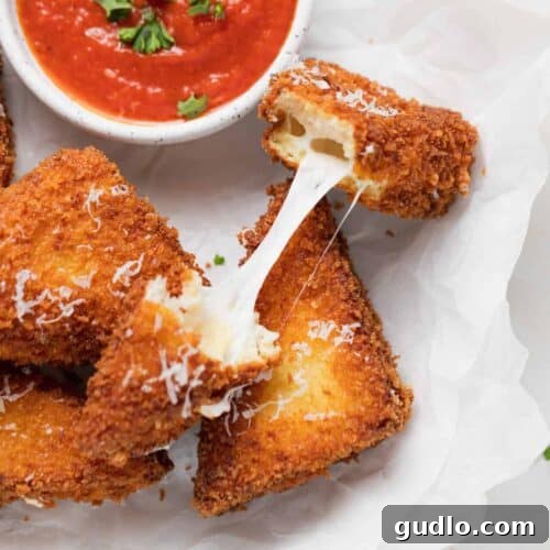 Golden Fried Mozzarella 2 Golden brown Mozzarella in Carrozza sandwiches with marinara dipping sauce