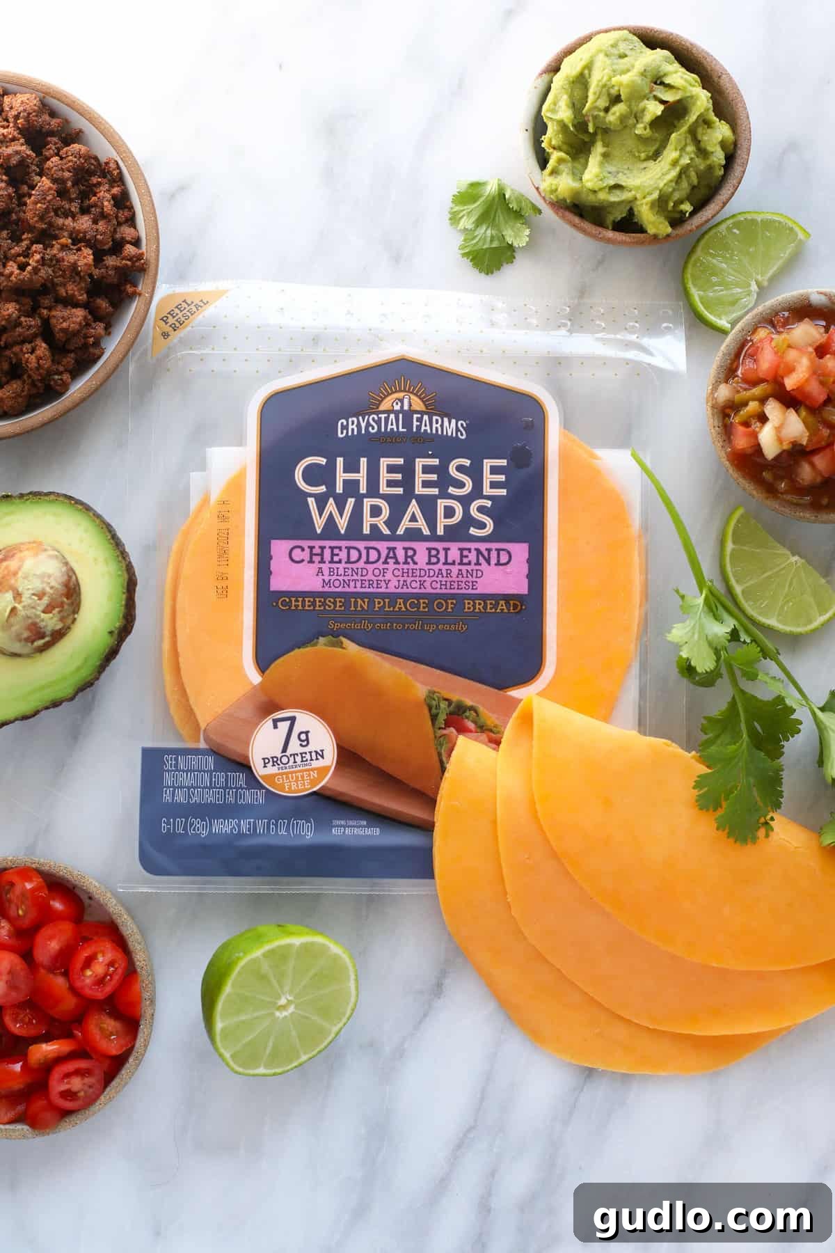 All the ingredients laid out for making a cheesy tortilla quesadilla, highlighting simplicity.