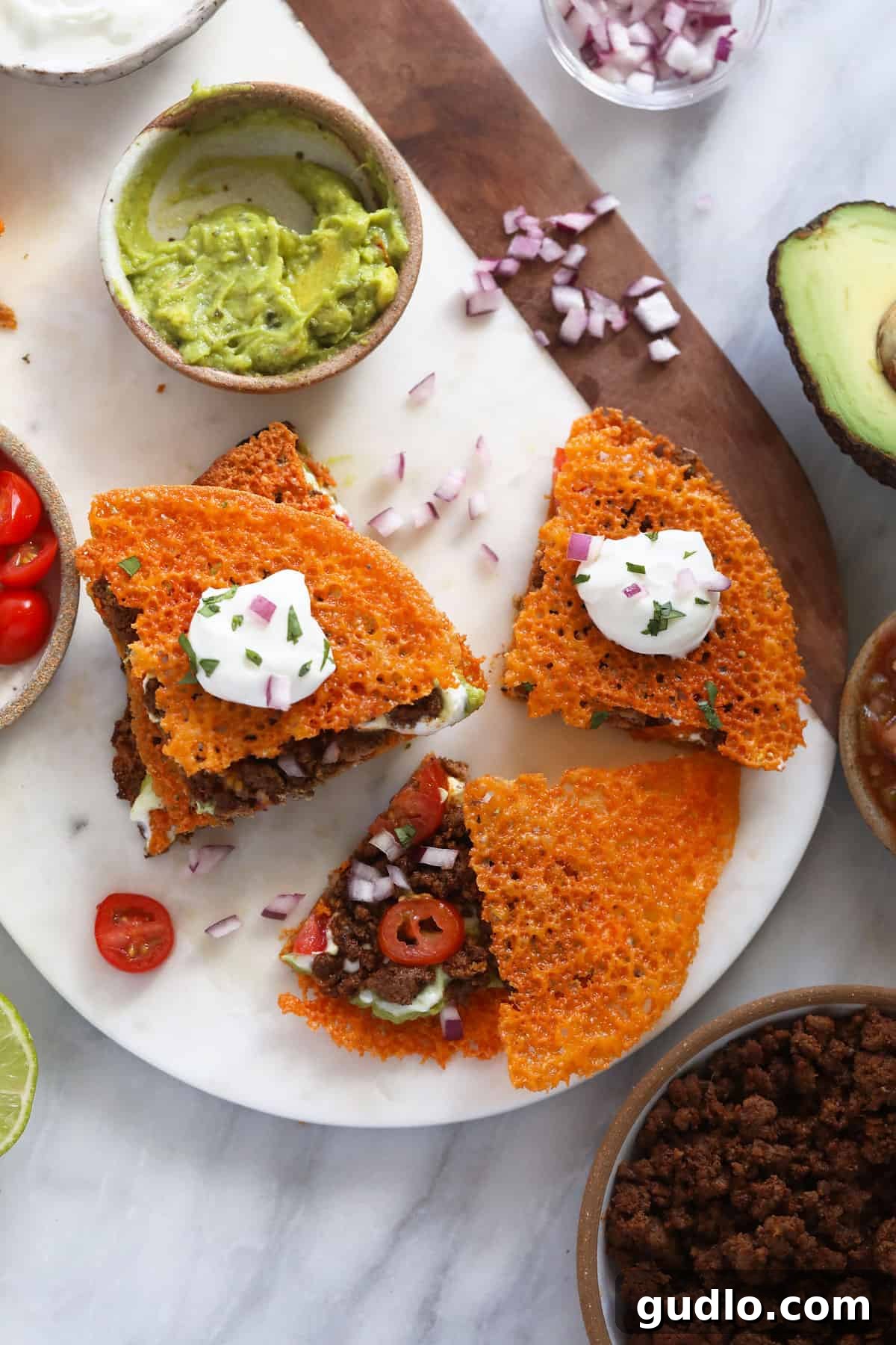 A delicious keto quesadilla resting on a wooden cutting board, showcasing its rich protein content and cheesy goodness, making it a satisfying recipe.