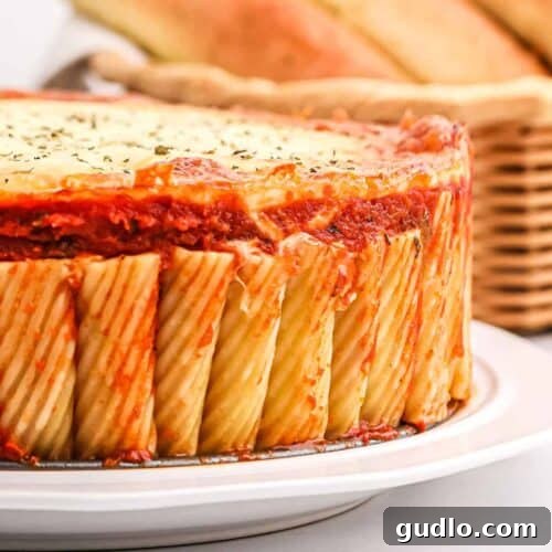 Rigatoni Timballo 2 Rigatoni Pie, also known as Honeycomb Pasta, baked to golden perfection with cheese.