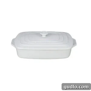 Cherry Cream Cheese Cloud Cake 3 a white rectangular baking dish on a white background.