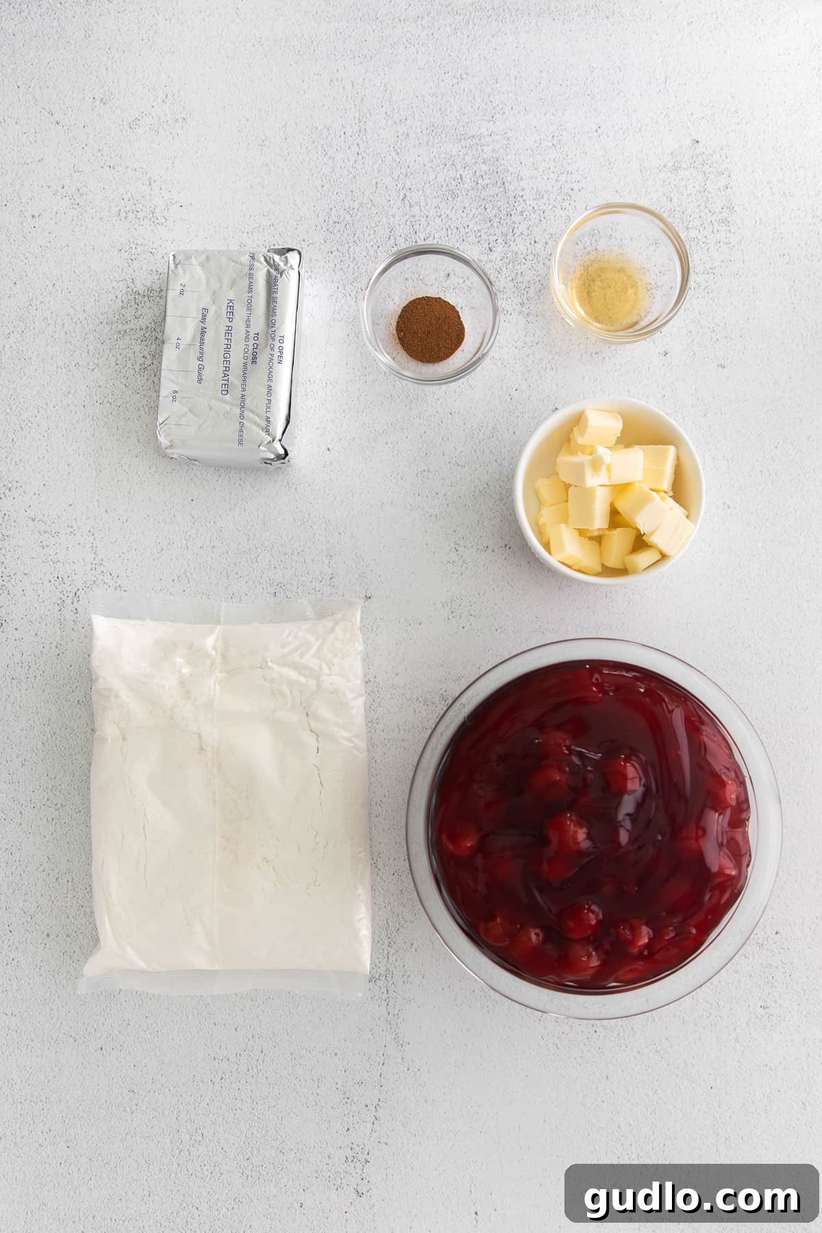 This Cream Cheese Cherry Dump Cake is calling your name! Dump all the ingredients into a cake pan, bake it, and enjoy topped with a scoop of vanilla ice cream. cherry dump cake ingredients.