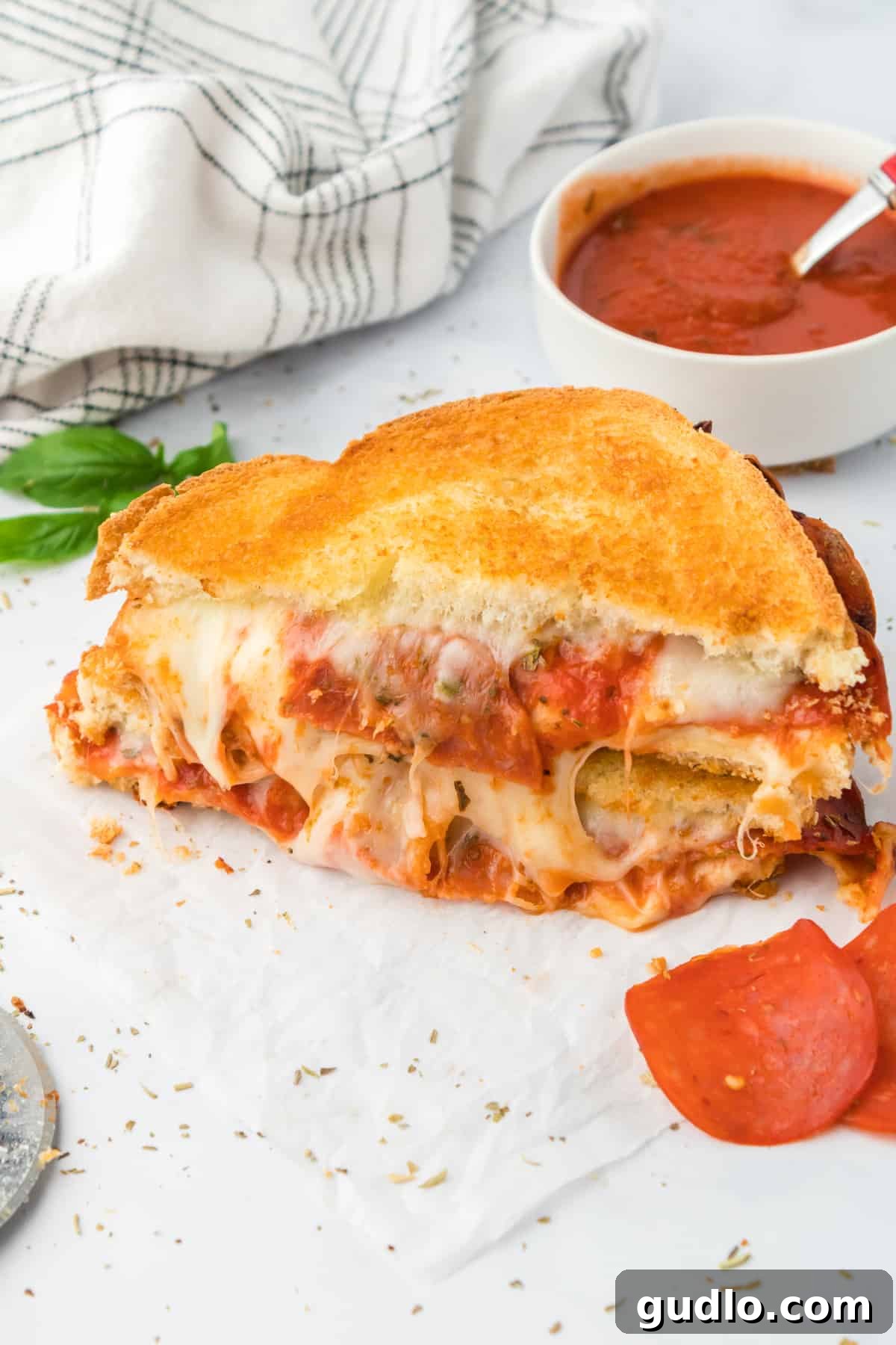 Sliced Air Fryer Pizza Grilled Cheese ready to be enjoyed. Another view of a sliced pizza grilled cheese, beautifully arranged.