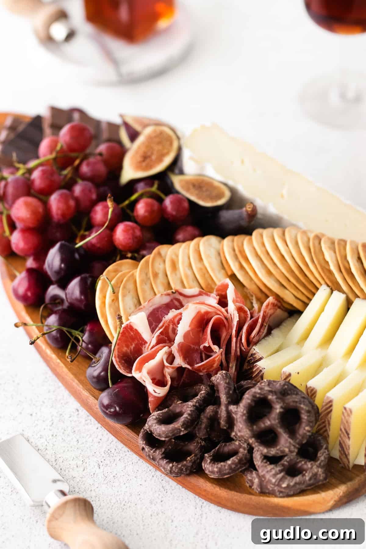 A fully assembled chocolate and cheese board, beautifully presented and ready to be served to guests.