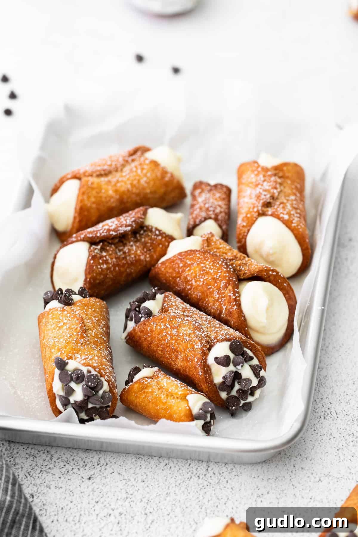 Authentic Italian Cannolis 7 Assembled cannolis beautifully arranged on a serving platter.