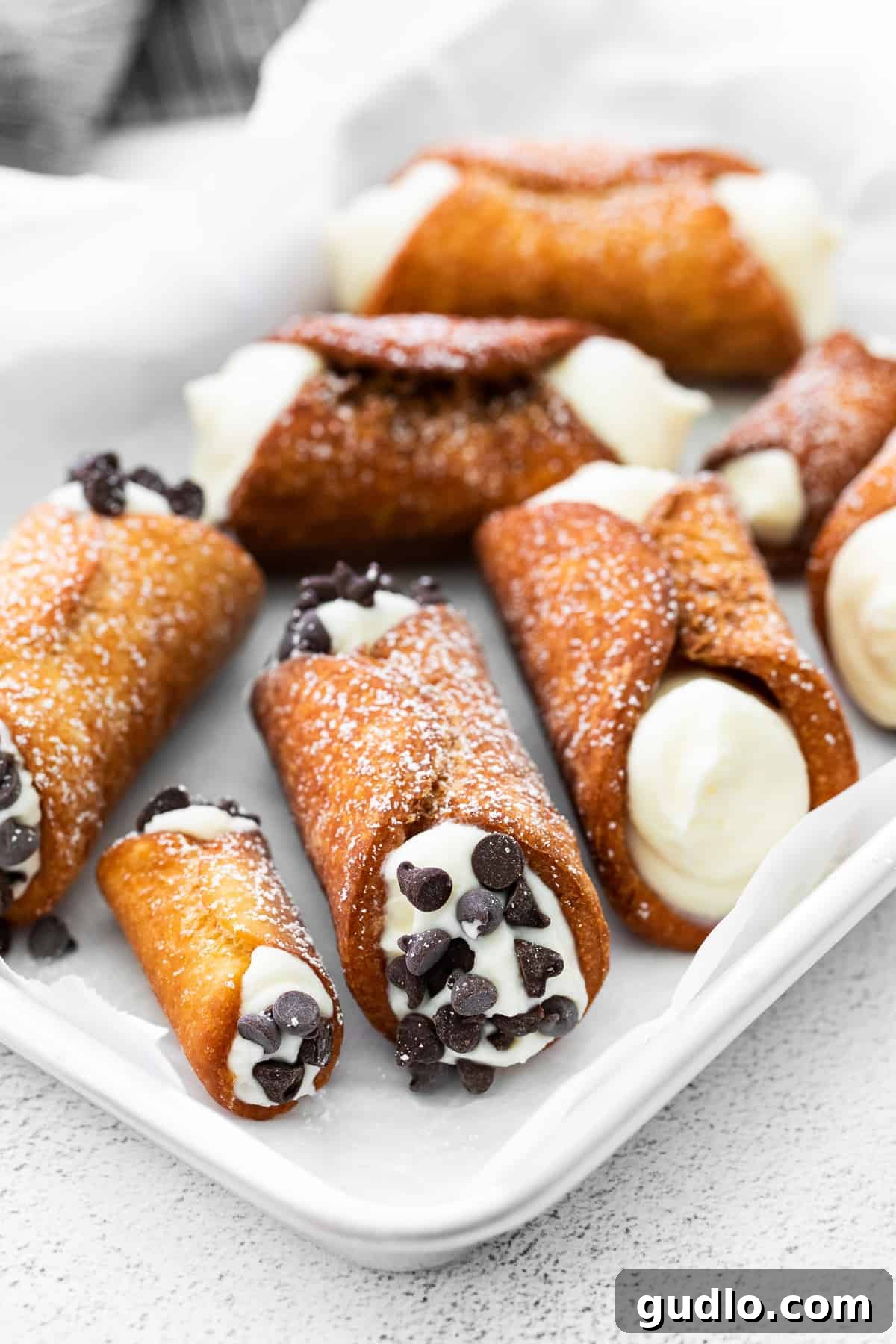 Authentic Italian Cannolis 8 Multiple cannolis arranged on a elegant platter, perfect for a holiday gathering or special occasion.