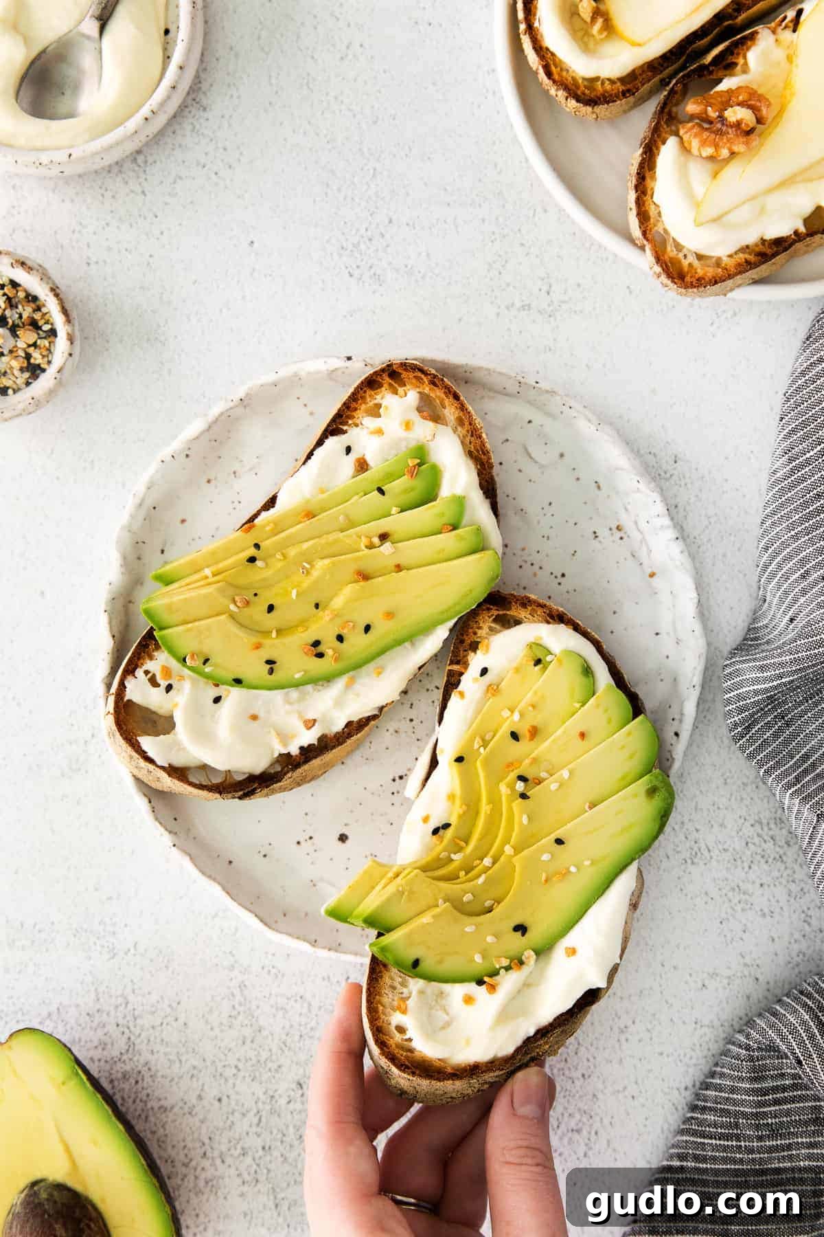 Ricotta Toast: Sweet and Savory Delights 7 Avocado and everything bagel seasoning on top of ricotta toast.
