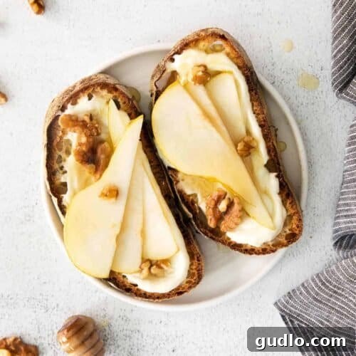 Ricotta toast with pears, walnuts, and honey.