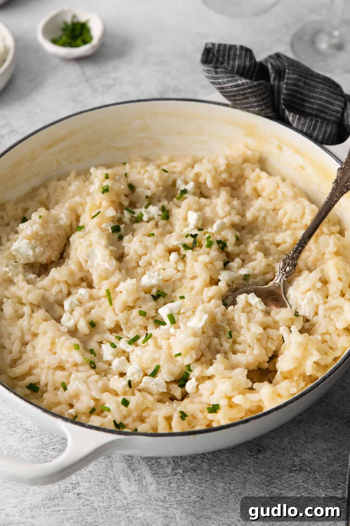 The exquisite texture of perfectly cooked risotto, a testament to patient cooking. A close-up of creamy risotto in a pot, highlighting its rich texture and steam.