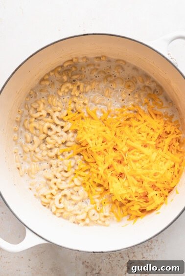 Cheesy macaroni and cheese in a pot.