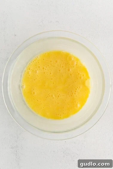 Whisked Eggs in a bowl.