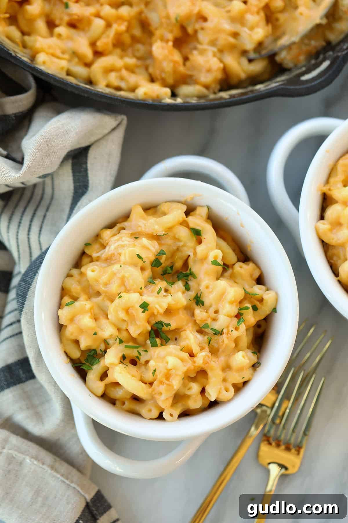 Ready to be enjoyed: a perfect bowl of smoked mac and cheese. Smoked mac and cheese in a bowl ready to be served.