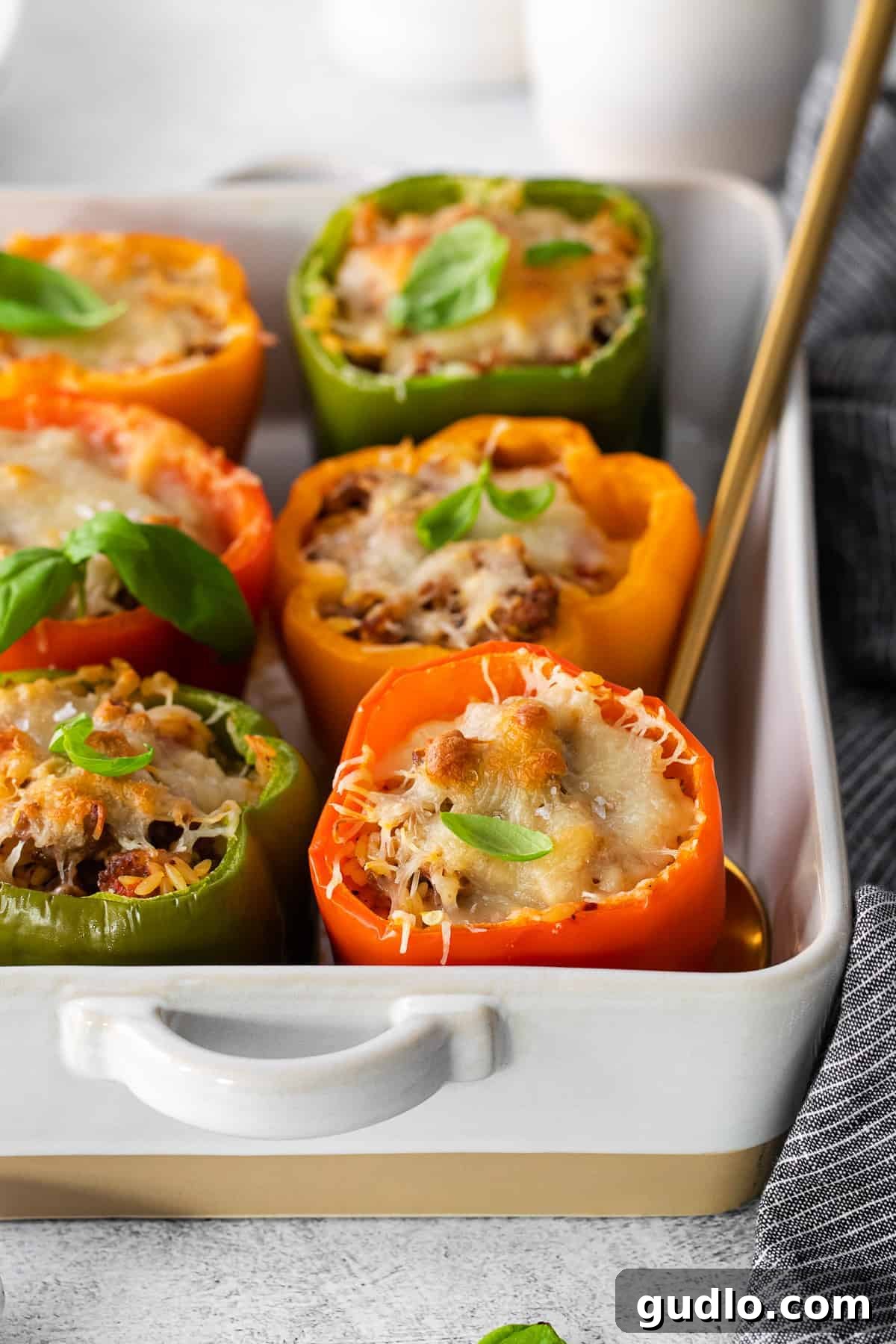 Delicious Italian Stuffed Peppers baked in a casserole dish, ready to serve.