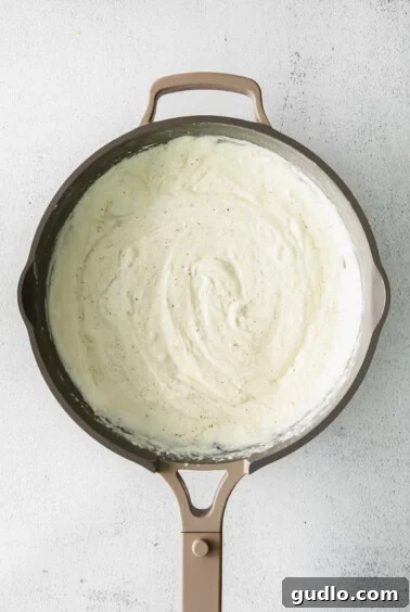 creamy sauce in a skillet.