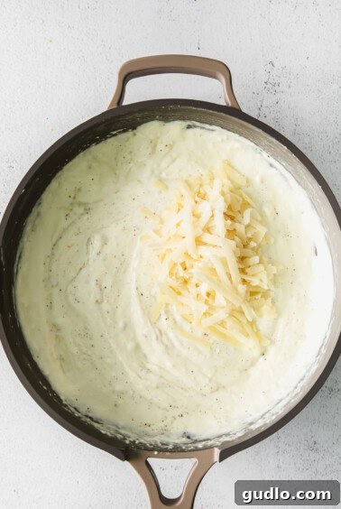 creamy pasta sauce in a skillet.