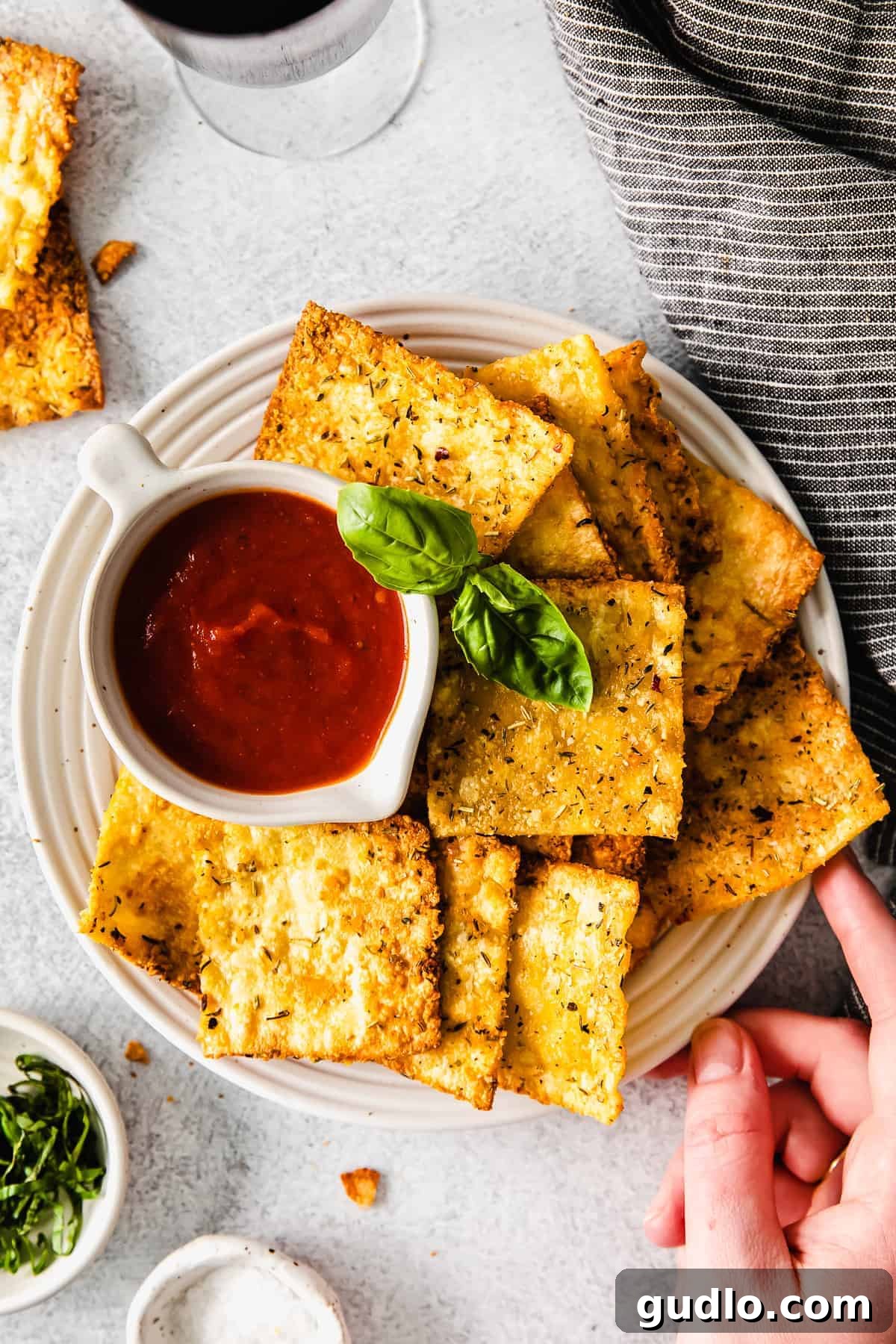 Crispy Air Fryer Pasta Chips on a plate, ready for dipping