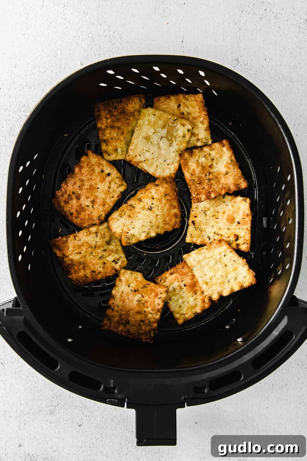 A large batch of Air Fryer Pasta Chips piled high, ready to serve