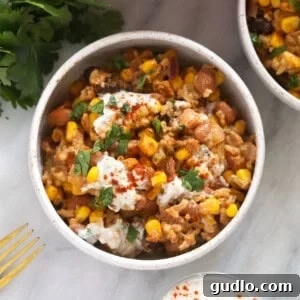 A delicious Mexican street corn casserole, baked golden brown in a rustic dish.
