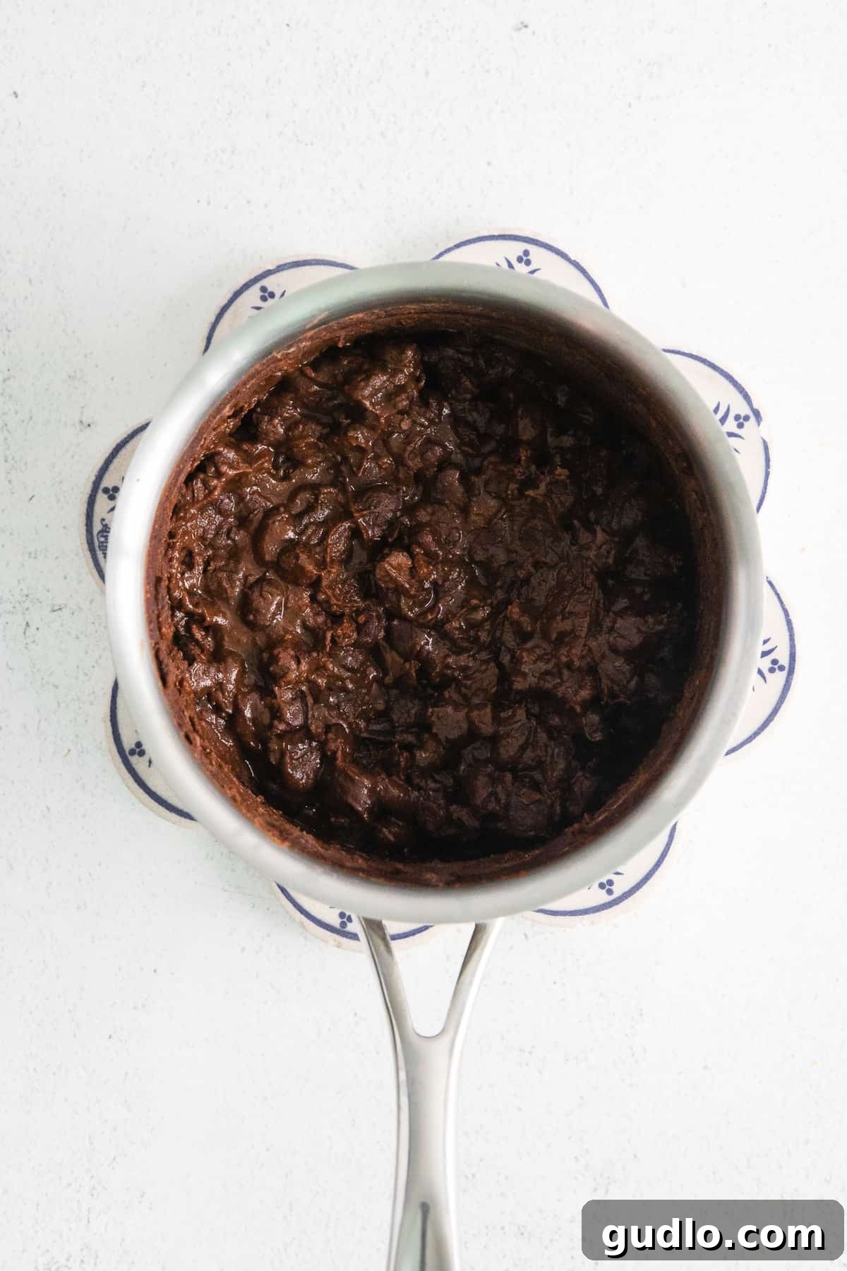 Southwest Breakfast Classic 5 A small pot of black beans seasoned with taco seasoning simmering on the stove.