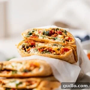 Golden Cheesy Crunch Stack 2 Starbucks Spinach Feta Wraps, packed with veggies and protein.