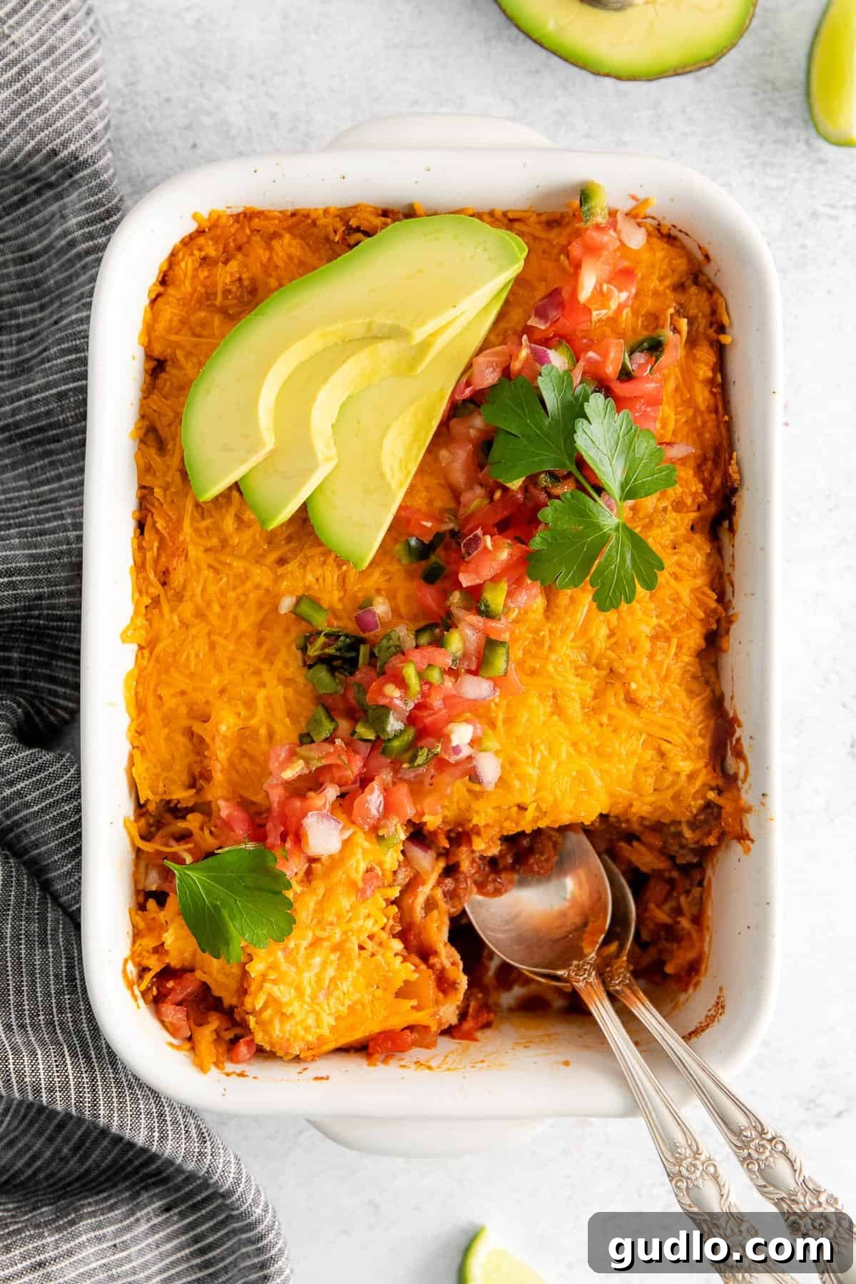 Cheesy Taco Bake 2 Beef taco bake in a casserole dish, ready to be served.