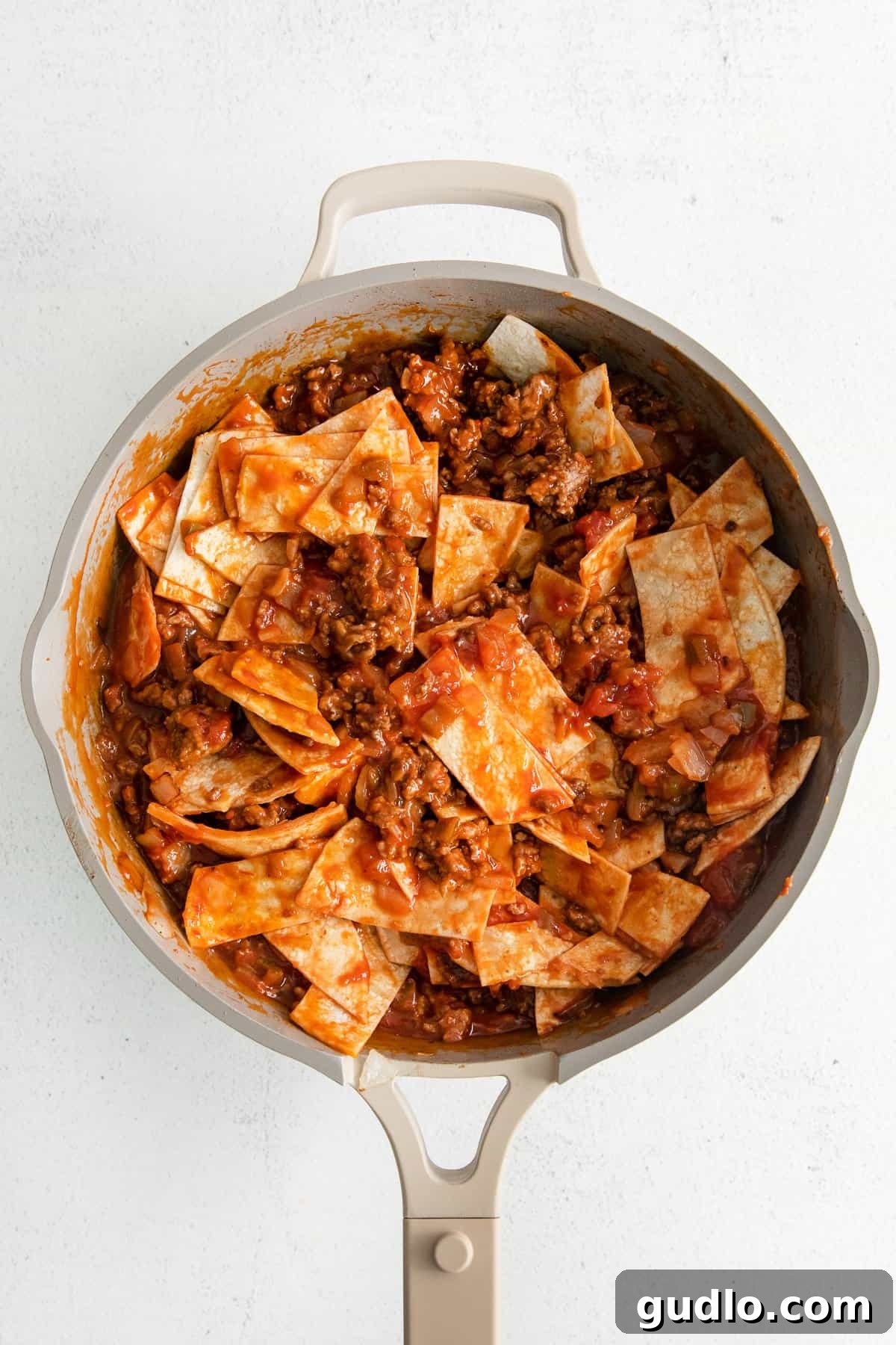 Cheesy Taco Bake 7 Taco bake filling in a skillet, close up of the texture.