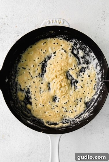 Creamy Bechamel Lasagna 7 Butter melting in a saucepan before adding flour to make a roux for the bechamel sauce.