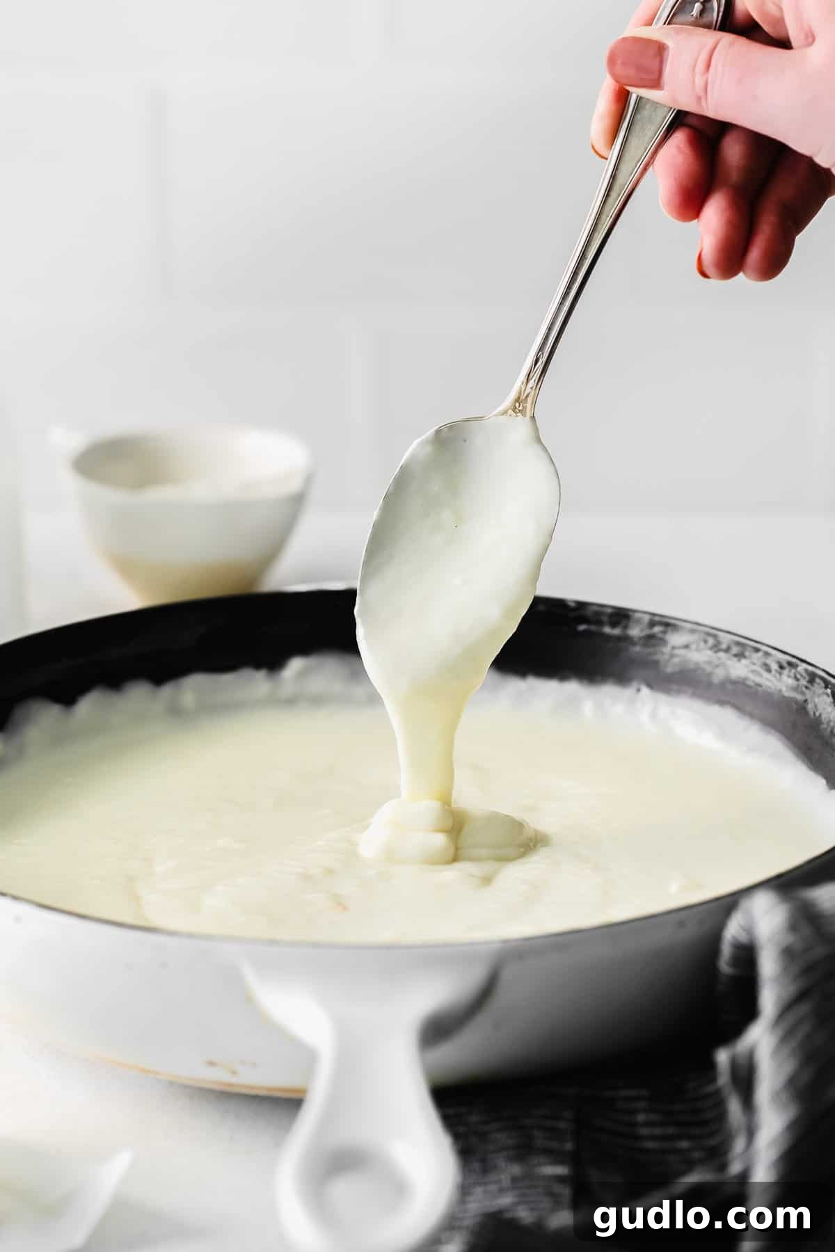 Perfecting Bechamel: The Mother Sauce 3 A freshly made, perfectly smooth bechamel sauce resting in a pan, ready for its next use.