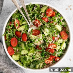 Herbed Olive Oil Marinated Goat Cheese 5 A vibrant lemon orzo salad, perfect for pairing with marinated goat cheese.
