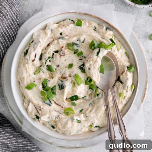 Sizzling Scallion Dip in a serving bowl, garnished.