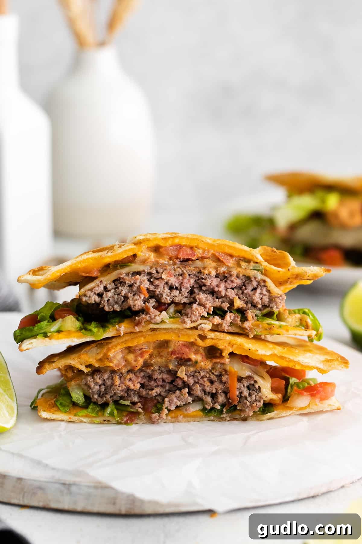 A delicious copycat Applebee's quesadilla burger, stacked high on a plate, ready to be enjoyed.