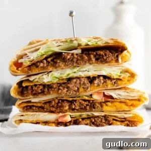A delicious copycat crunchwrap supreme, ready to be eaten.