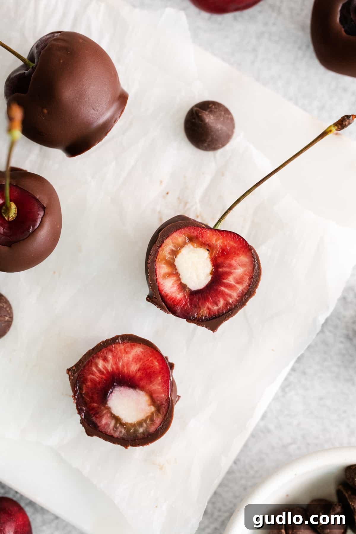 Velvet Cherry Mascarpone Chocolates 4 Close-up of fresh pitted cherries, each beautifully piped with a creamy mascarpone cheese filling, ready for their chocolate bath.