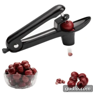 Velvet Cherry Mascarpone Chocolates 5 A high-quality, ergonomic cherry pitter, essential for quick and easy cherry preparation.