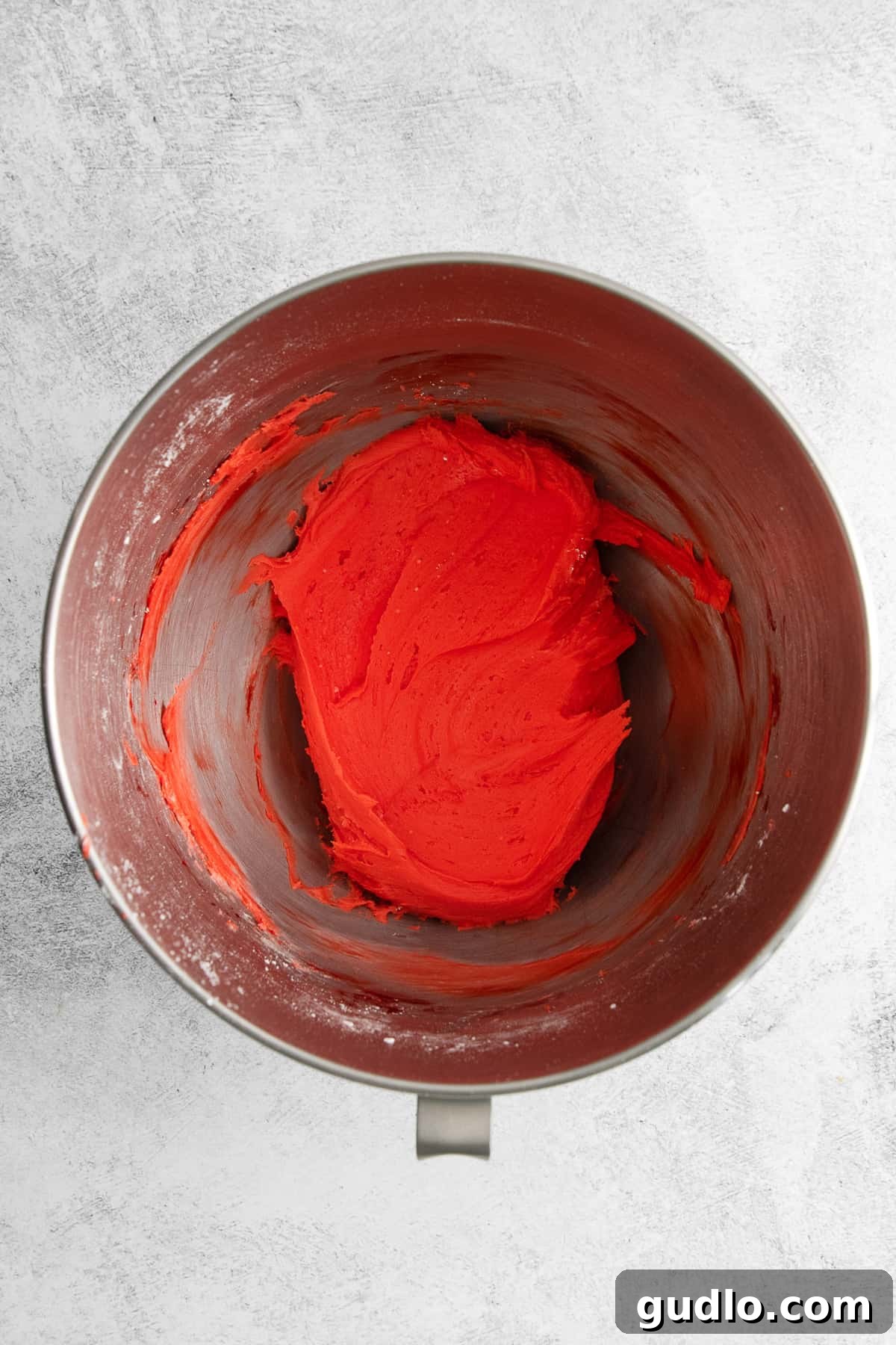 Cream Cheese Mint Dough, Perfectly Blended Smooth, pastel green cream cheese mint dough in a mixing bowl, perfectly ready for shaping.