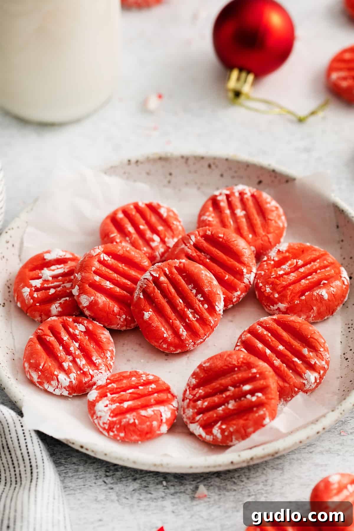 Holiday Red Cream Cheese Mints Festive red cream cheese mints arranged on a plate, perfect for Christmas or Valentine's Day.