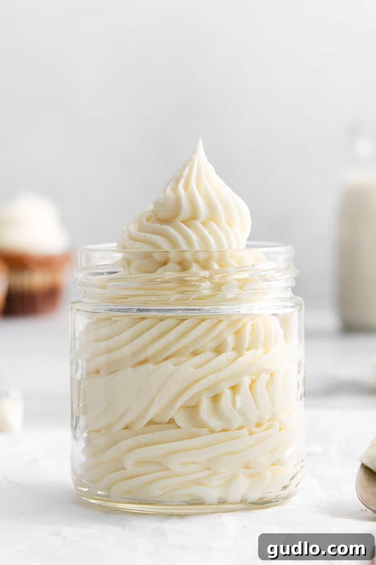 This cream cheese buttercream frosting is ultra-rich, creamy, and ridiculously easy to make! Cream cheese buttercream frosting in a jar.