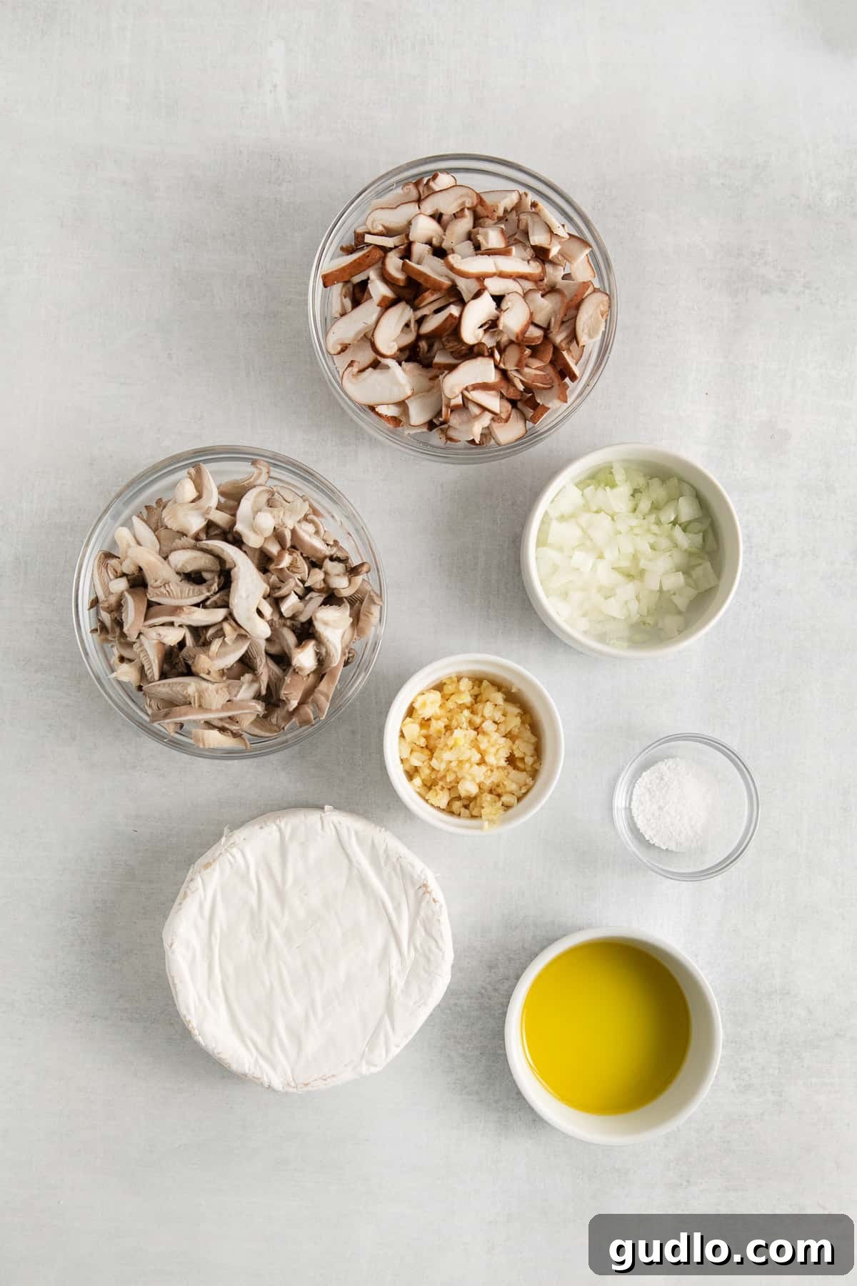 All the fresh ingredients for homemade mushroom ravioli laid out.