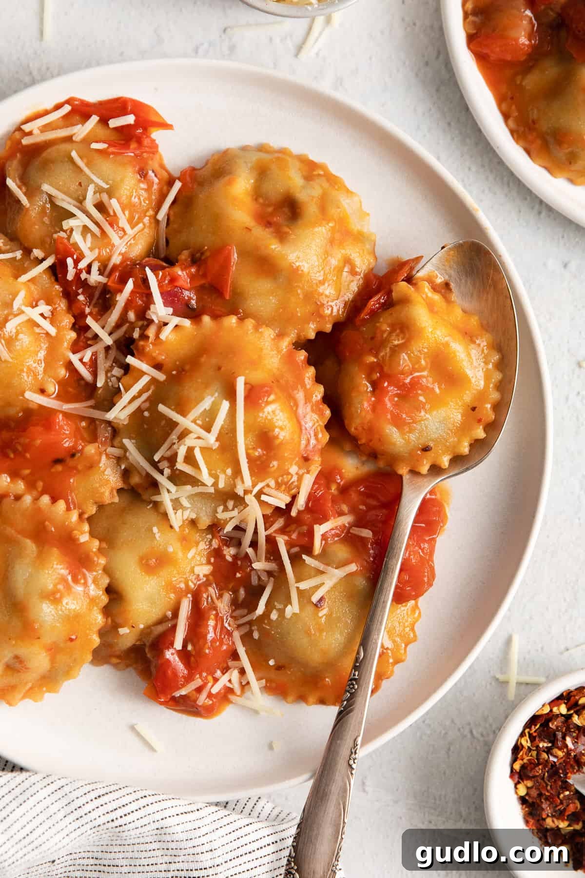 A close-up of mushroom ravioli, showing the rich filling and texture.