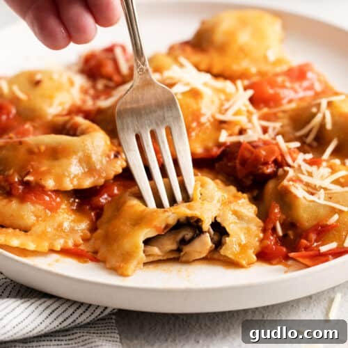Mushroom ravioli on a plate.