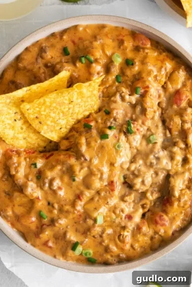 A bowl of hot Rotel dip ready for serving.
