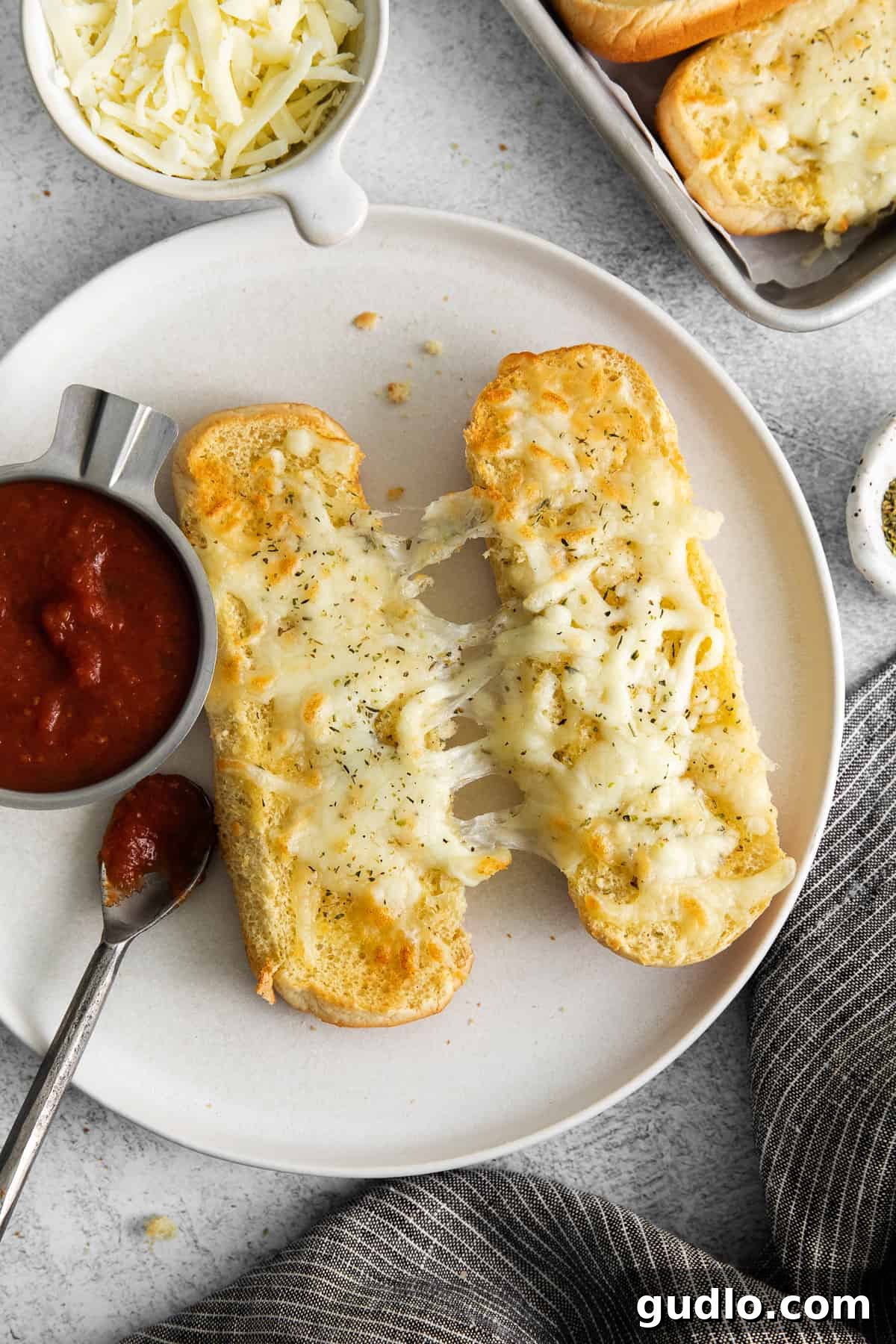 Serving Plate of Italian Dunkers Perfectly baked Italian dunkers served on a white plate, showcasing their inviting golden crust and melted cheese.