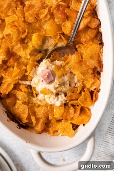 A freshly baked chicken cordon bleu casserole, bubbling and golden.