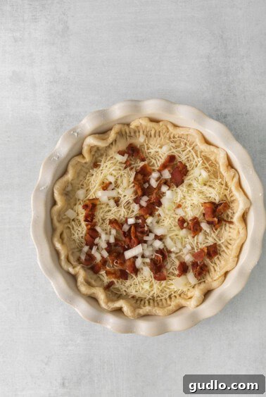 Classic French Quiche Lorraine 6 A pie crust filled with bacon, cheese, and onions.