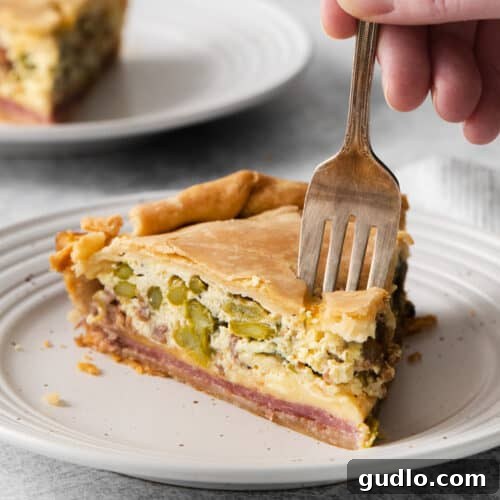 A delicious slice of Italian Easter pie on a plate, showcasing its layers.