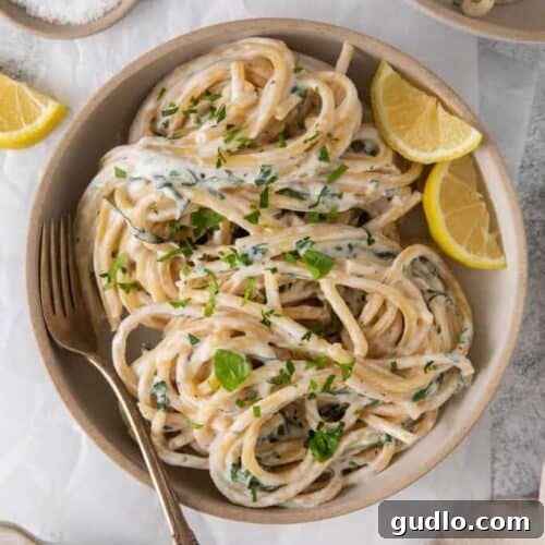 Lemon ricotta pasta in a bowl, ready to be served.